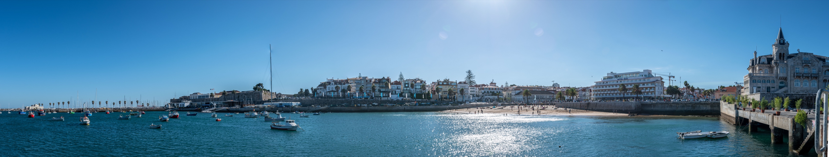 A panoramic waterfront view across Cascais Bay